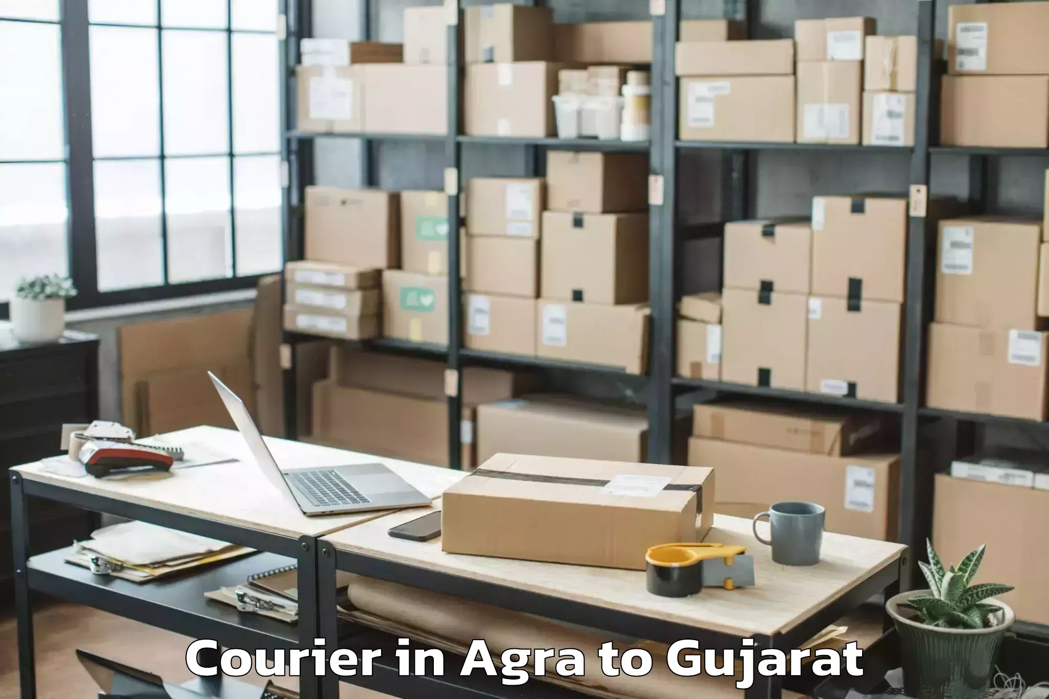 Agra to Kheralu Courier Booking